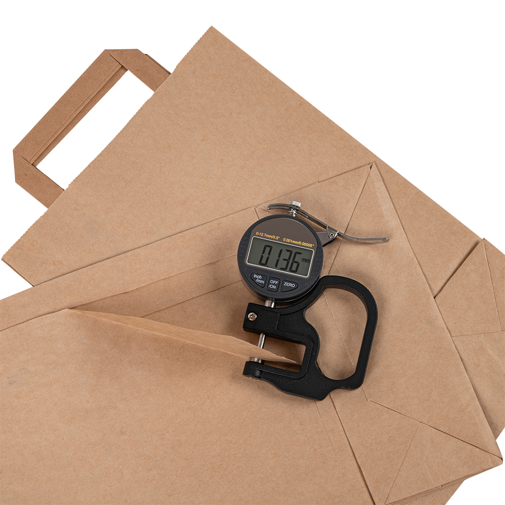 Крафт пакет с плоской ручкой, 70 г/м², 22*9*33 см Крафт пакет с плоской ручкой, 70 г/м², 22*9*33 см