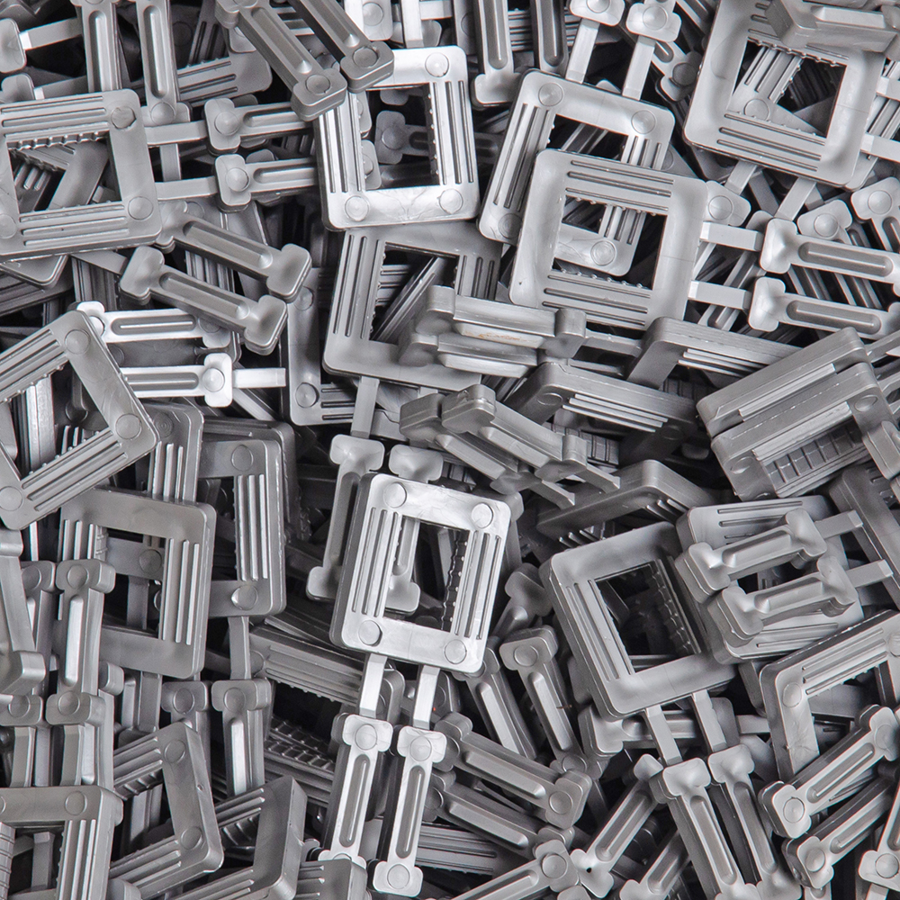 Пряжка пластмассовая серии ТН 12-15 мм, 1000 шт./уп. Пряжка пластмассовая серии ТН 12-15 мм, 1000 шт./уп.